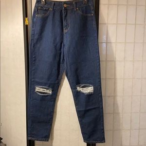 Distressed blue jeans